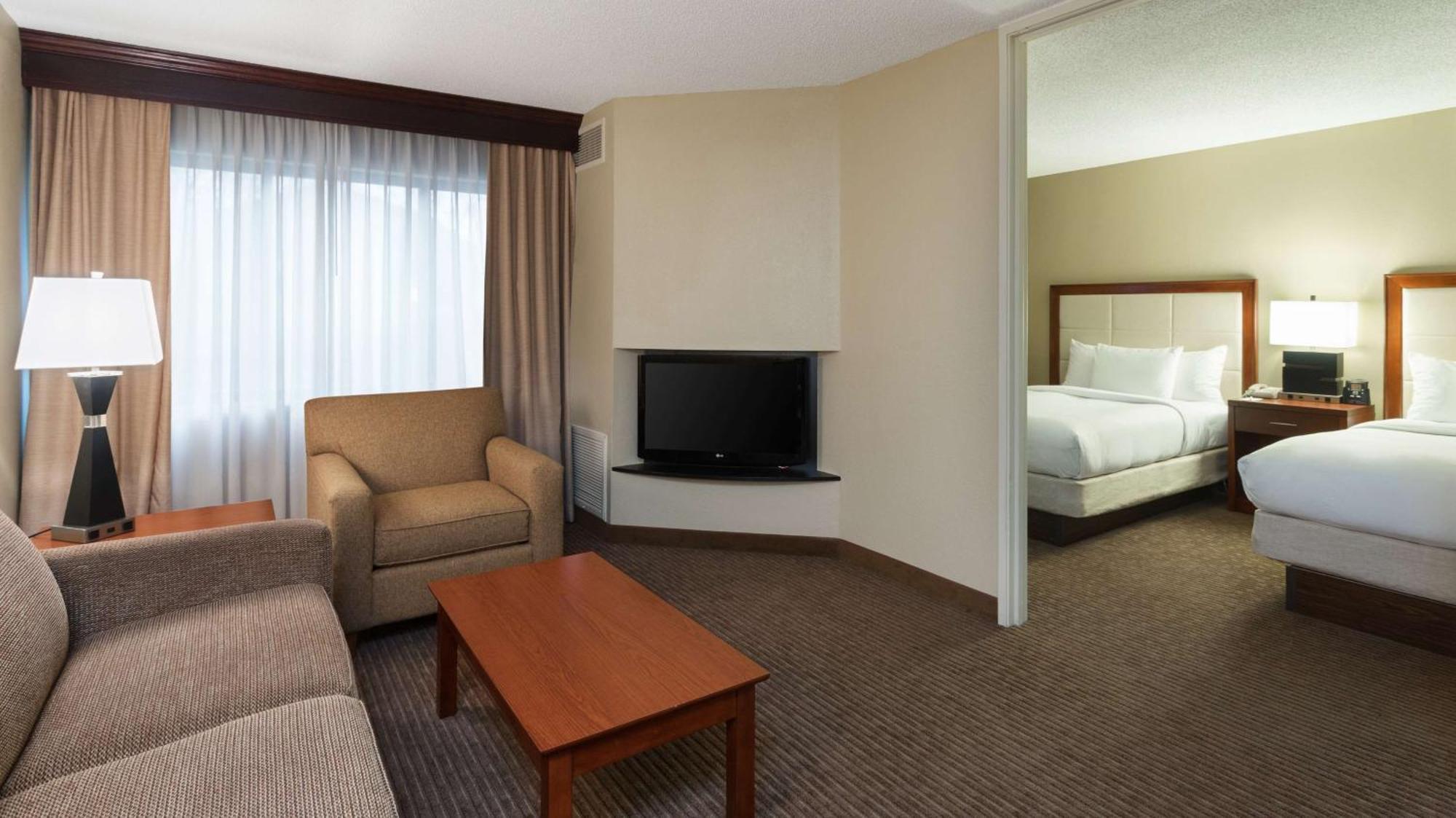 Standard Suite with Two Double Beds and Sofa Bed